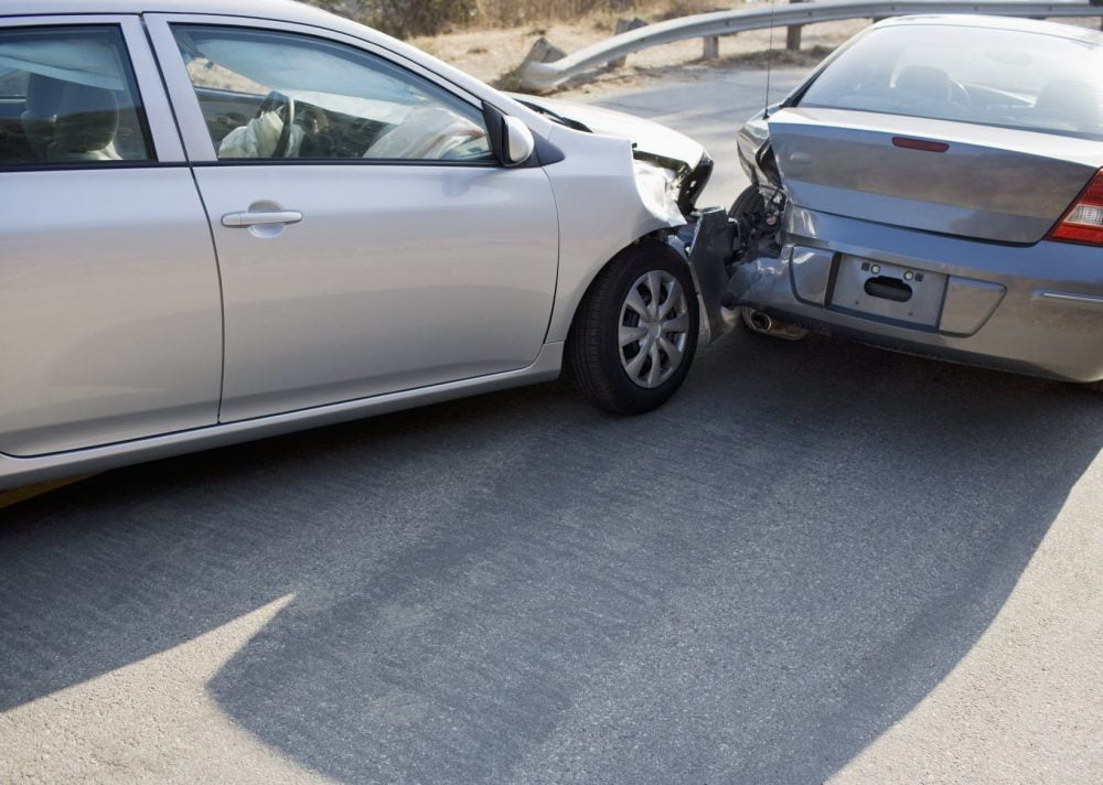 Rear End Car Accident On Rural Highway Stock Photo