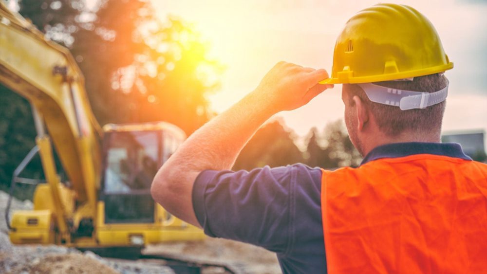Construction Worker Wearing A Hard Hat Stock Photo