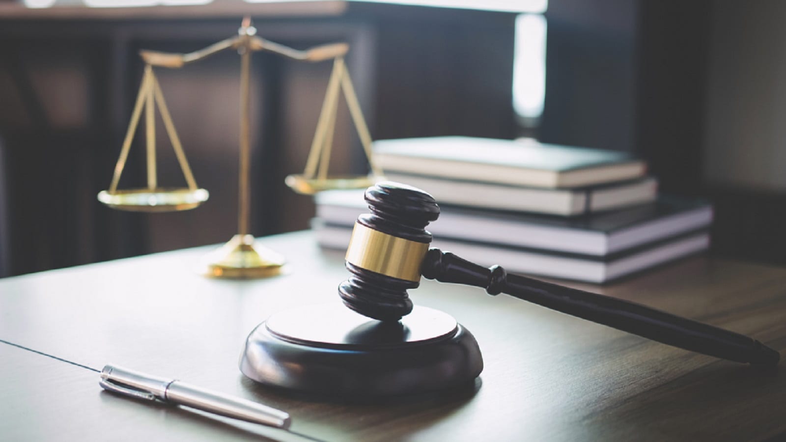 Scales of Justice With Gavel Stock Photo